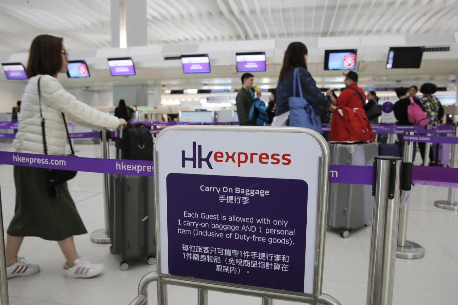 Hong Kong airline stops pregnancy tests for Saipan travelers AP News